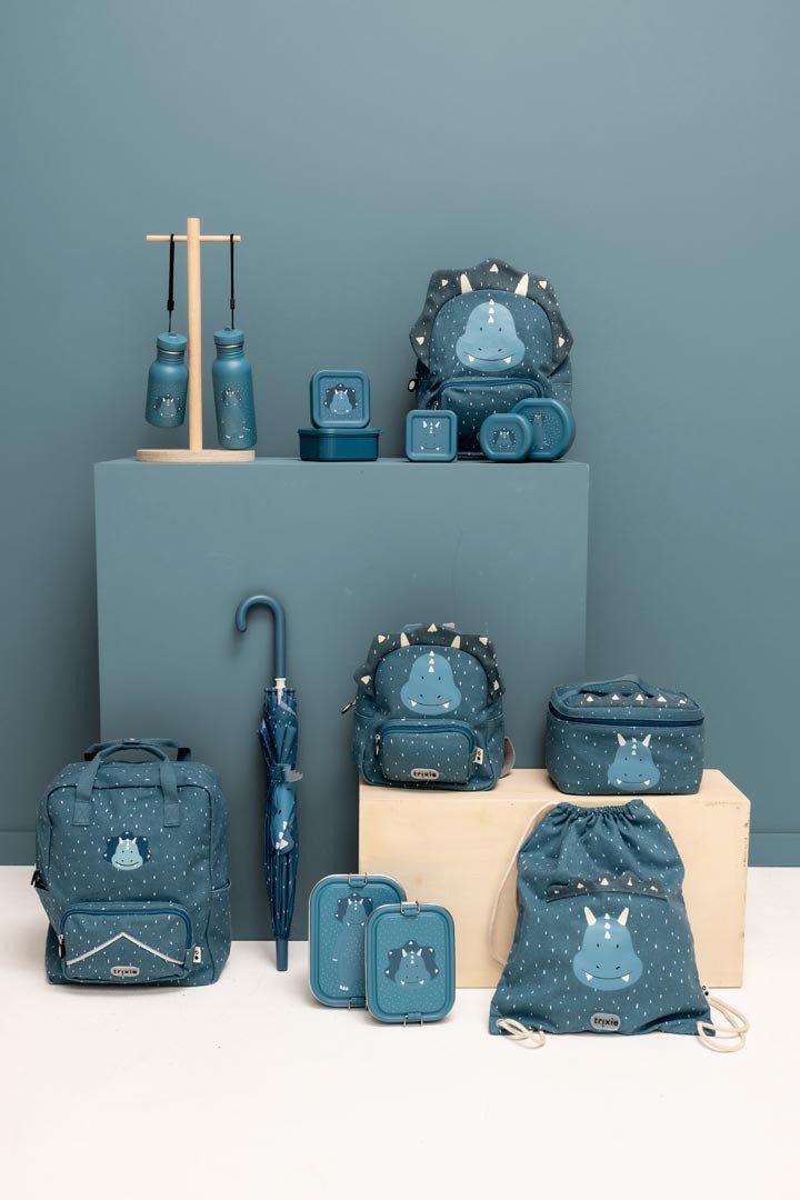 8. Collection of blue Mr. Triceratops themed items including bottle, backpack, and lunch boxes, by Trixie Baby