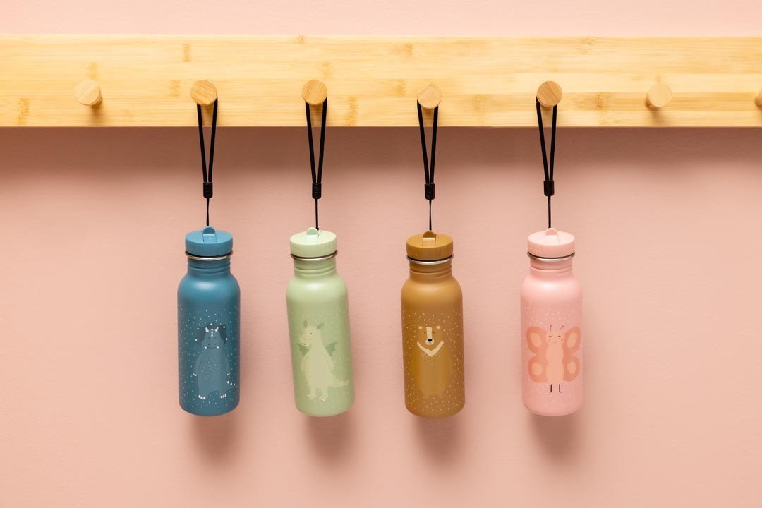 2. Four colorful stainless steel bottles hanging on hooks, including pink butterfly design