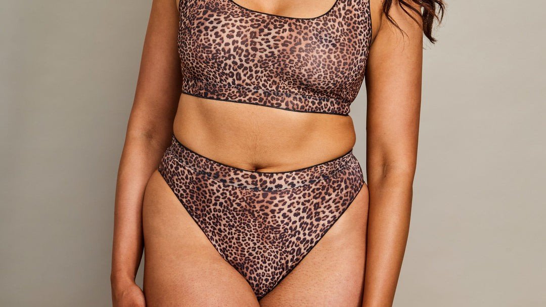 4. Front view of women's high-waisted bikini set in mini feline print by SWIMSARA, studio shot