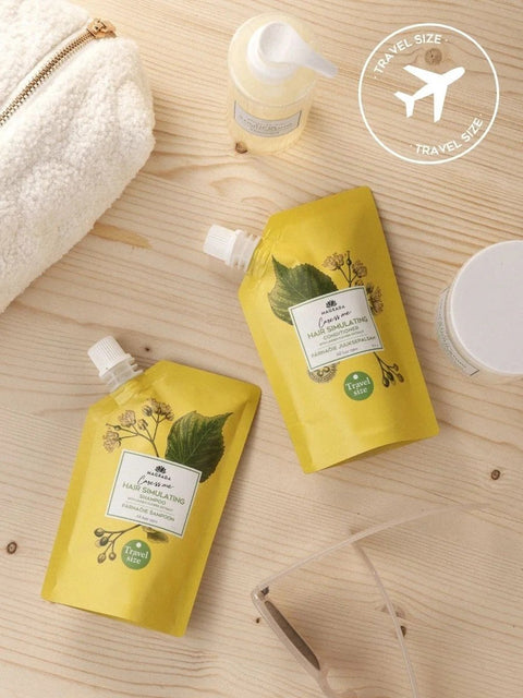 2. Two pouches of Magrada Organic Cosmetics Linden Flower Shampoo with Nordic Birch Extract on wooden surface