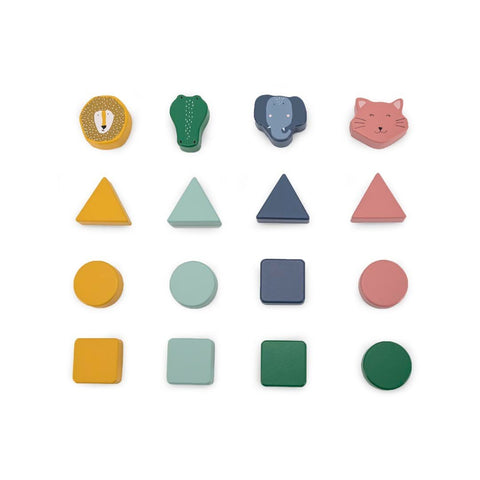 3. Close-up of Trixie Baby wooden shape sorter pieces including geometric shapes and animal faces