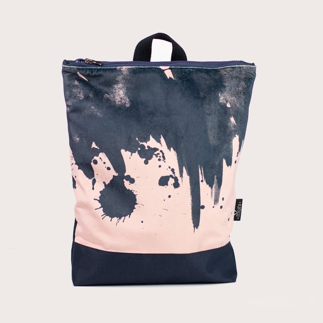 3. Muni Watercolor backpack in pink with navy blue bottom, studio shot