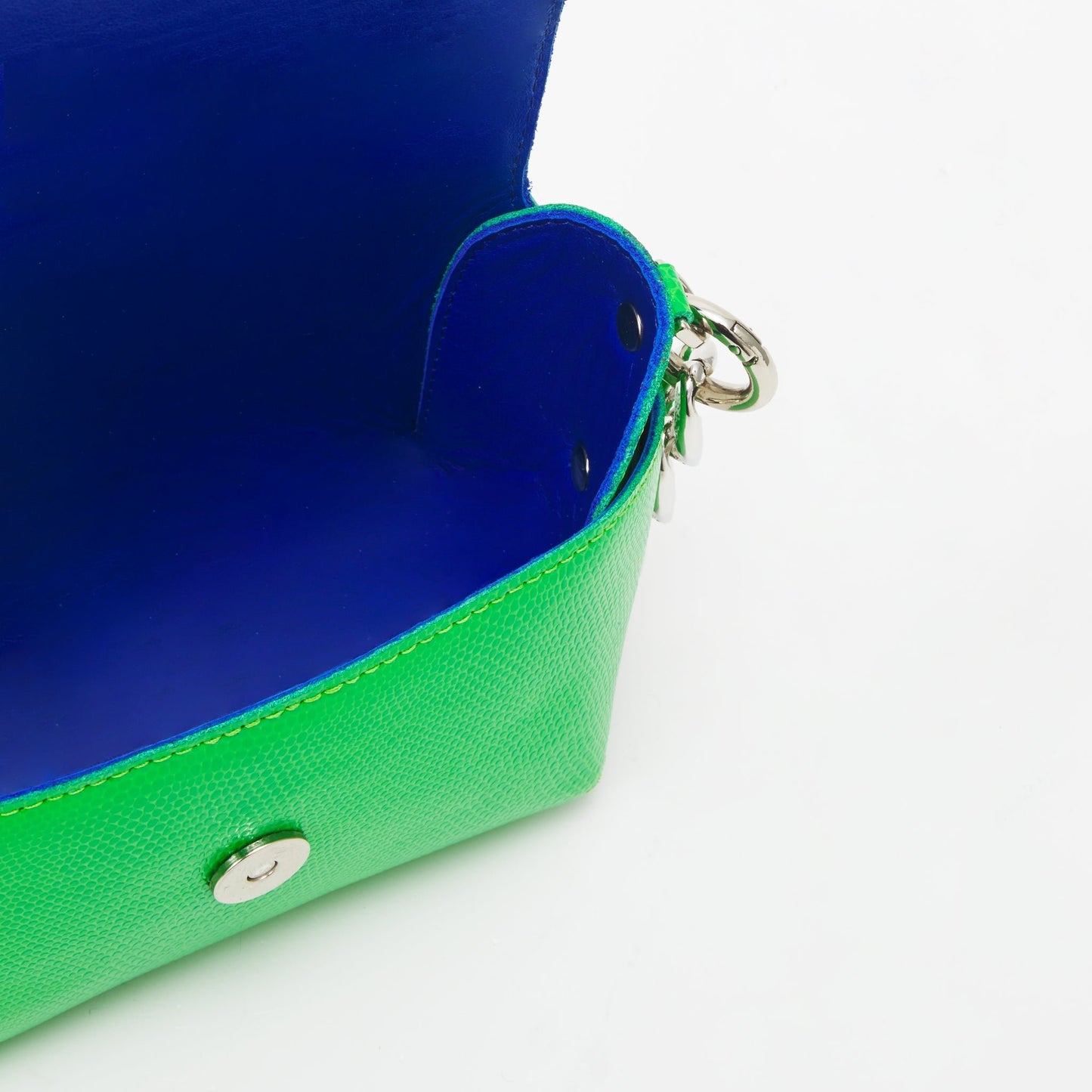 5. Close-up of Daz Studio leather shoulder bag's black strap and silver hardware details