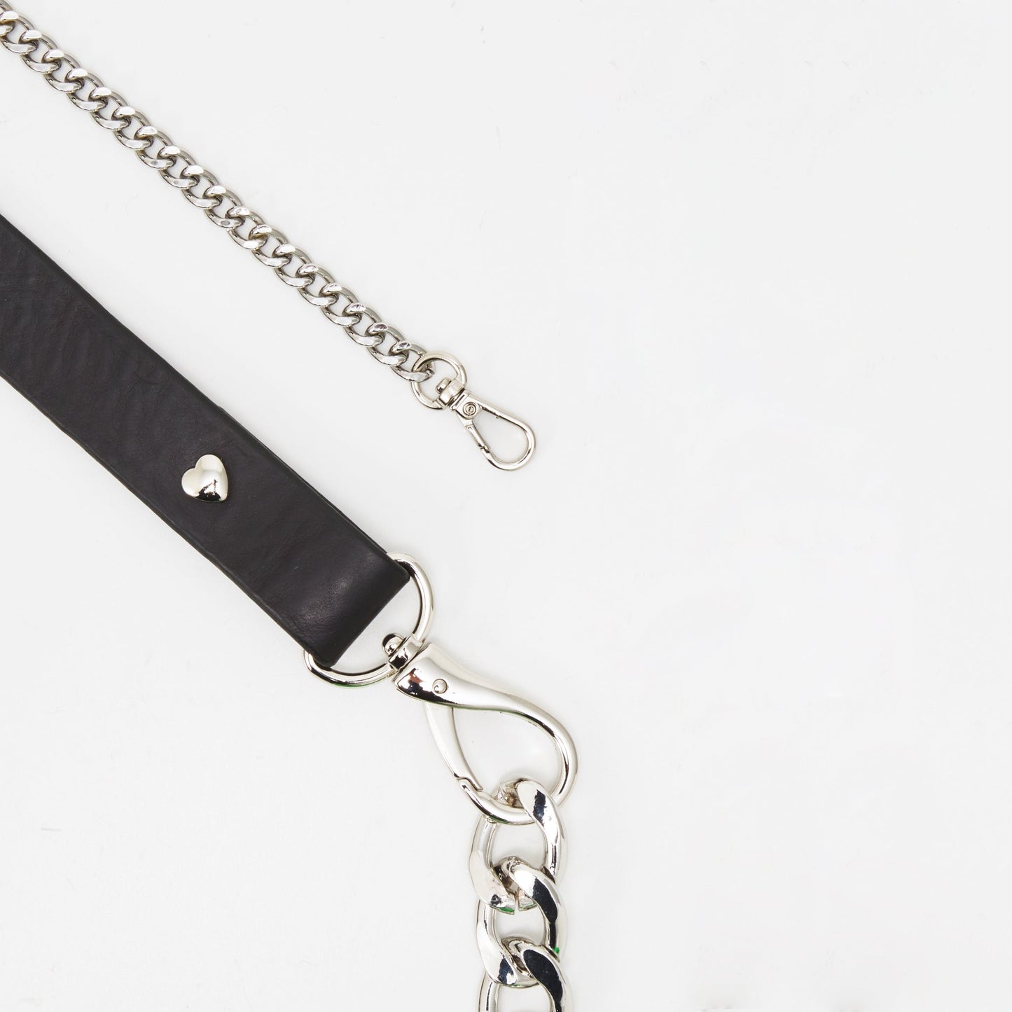 7. Side view of Daz Studio neon green leather shoulder bag showing brand logo and silver hardware
