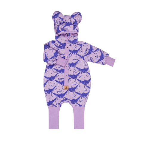 2. Lilac Fenio jumpsuit for babies with hood and ears, displayed flat with playful print