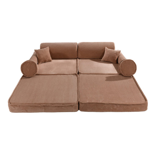 1. Large modular children's sofa in powder pink corduroy with multiple cushions, shown in a flat configuration