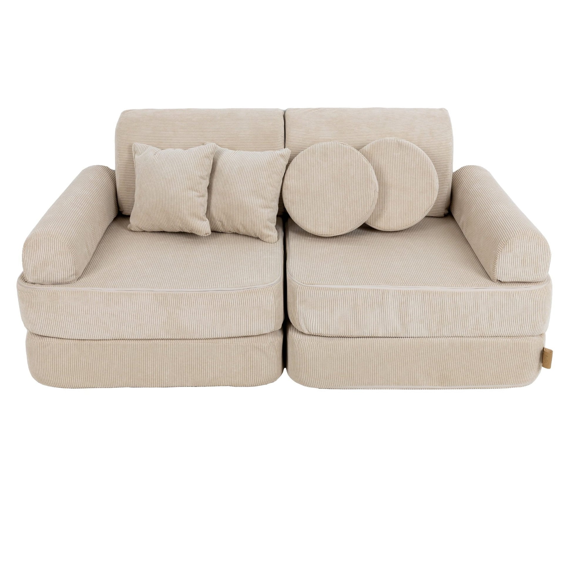 1. Medium modular children's sofa in ecru slimcord fabric with two square and two round cushions, shown in a compact configuration
