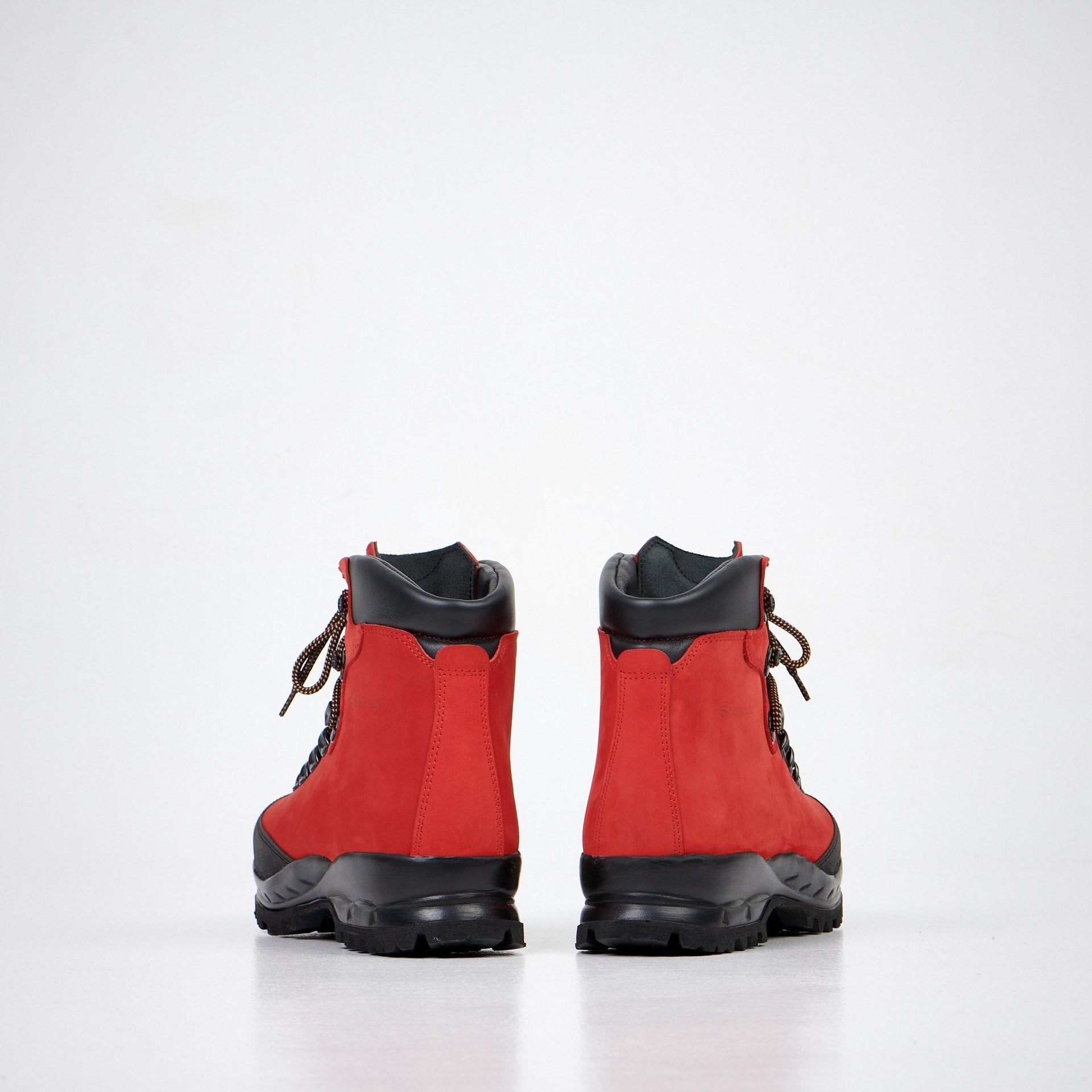 1. Back view of Samelin 553P Rosso Hiking Boots in red nubuck leather with black Vibram sole, studio setting