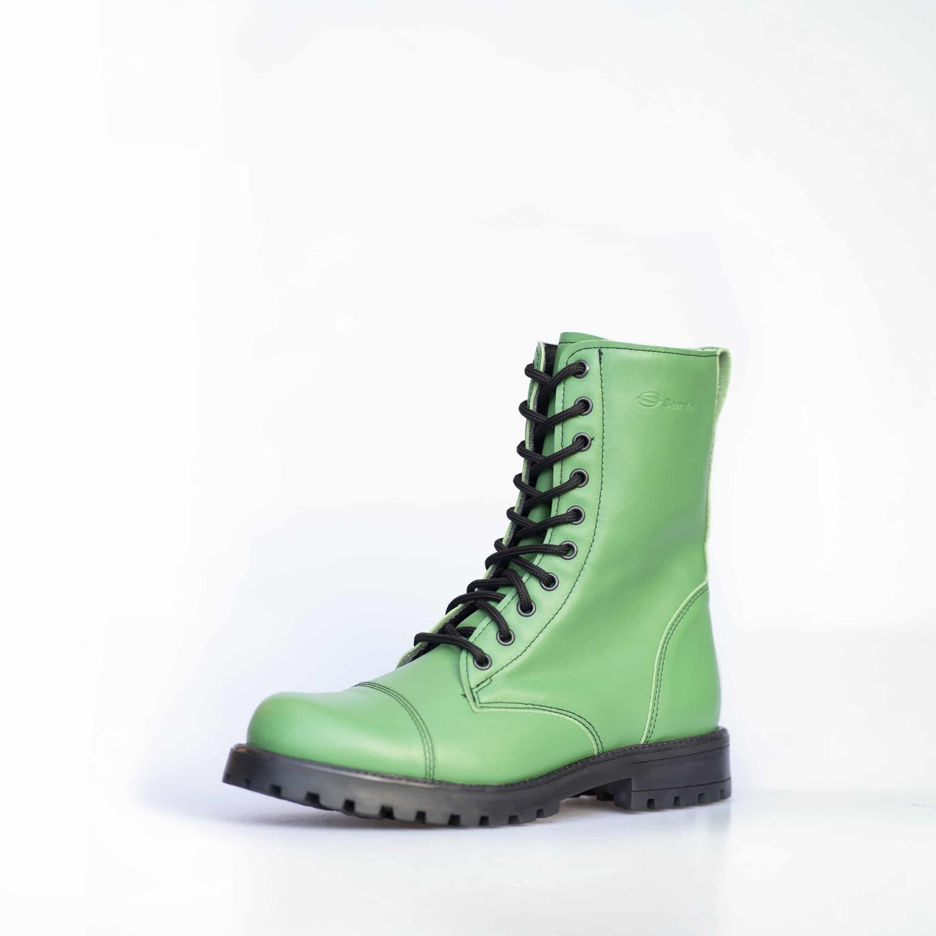 1. Unisex Samelin 511 Granny Smith boots in green leather, front view in studio setting