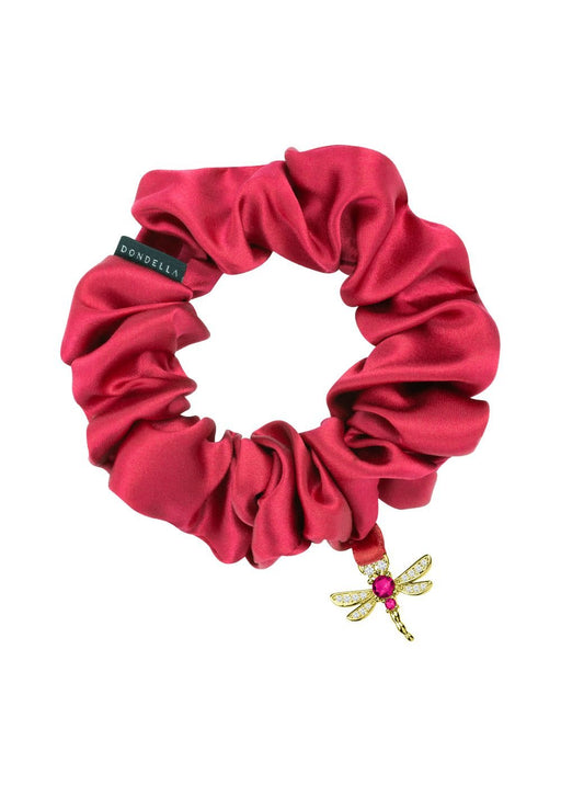 1. Woman wearing Olla Silk Ribbon Bracelet in dark red, styled as a hair accessory, showcasing satin finish and stainless steel ring