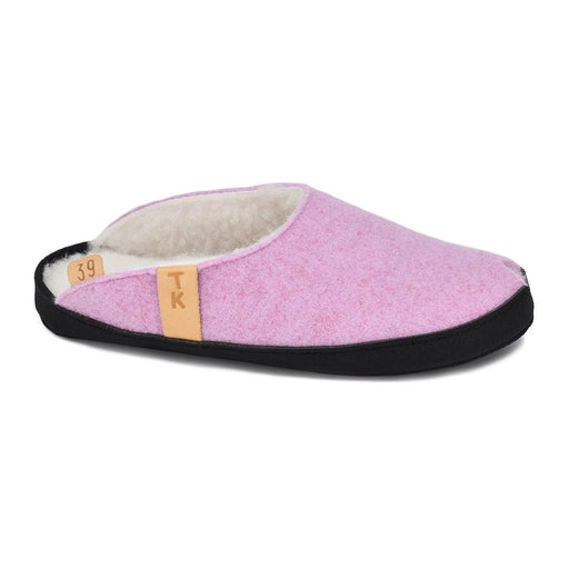 1. Unisex TOKU Bern white slippers by Omaking worn by a model in a lifestyle setting, showcasing comfort and style