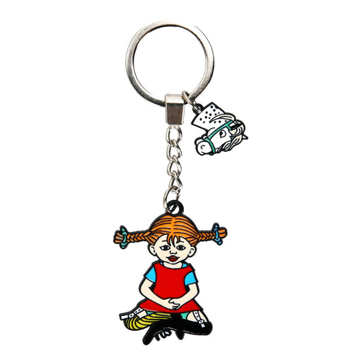 1. Zelma Kraft mini leather charm set with bow and hook, held in hand, showcasing silver metal details