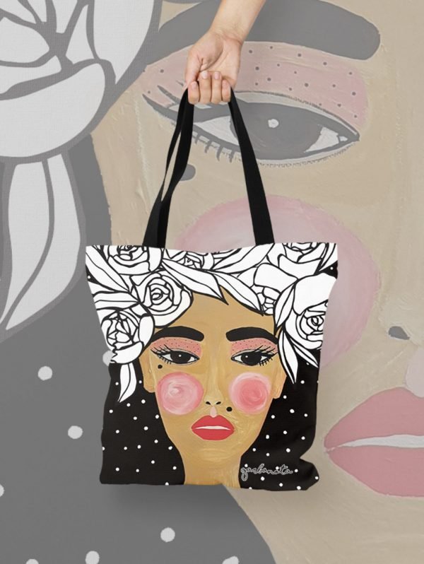4. Studio shot of Garbanota HANDBAG YOKO in black, highlighting artistic face print