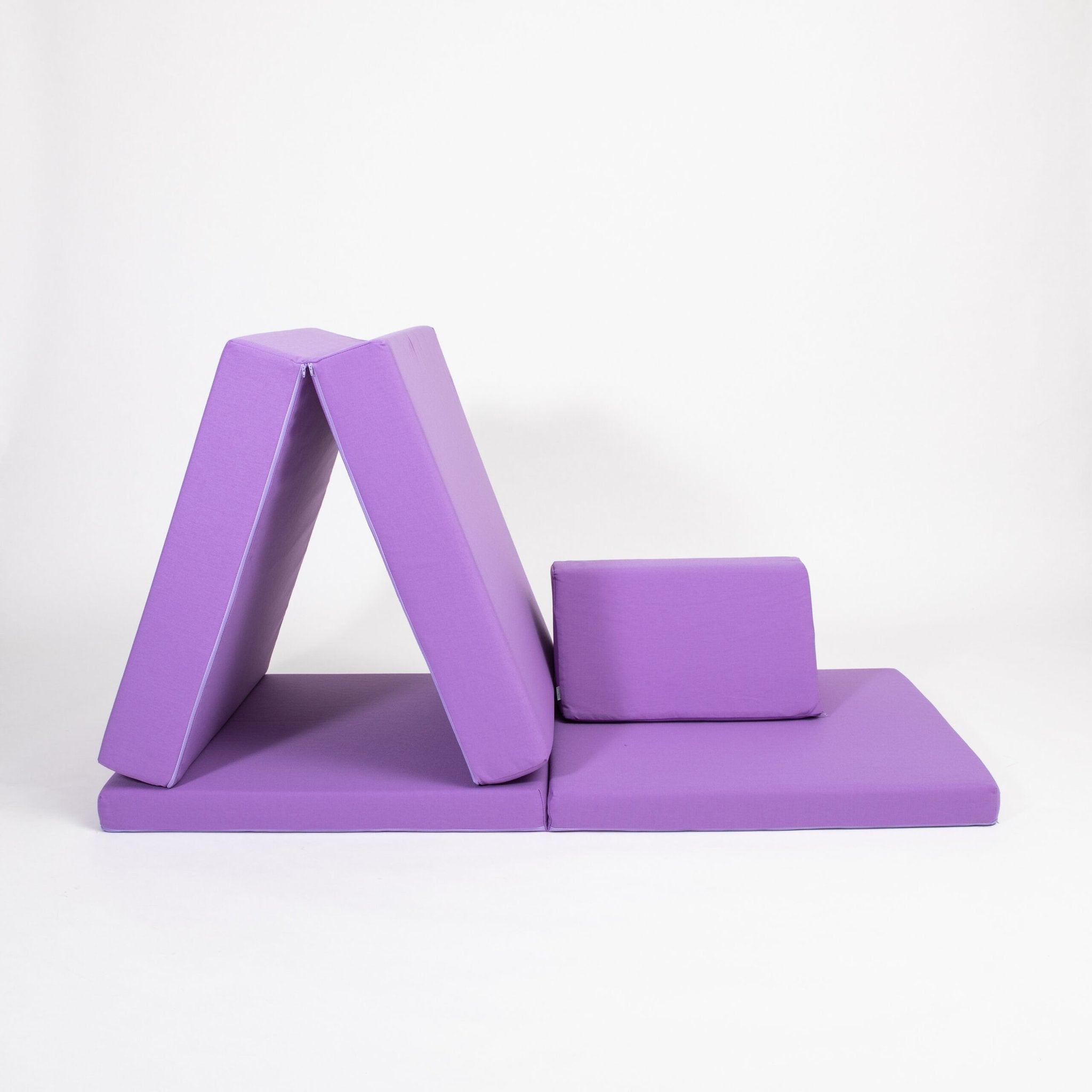 2. Purple activity play mattress set with trapezoidal pillows arranged in a tent-like structure on a white background
