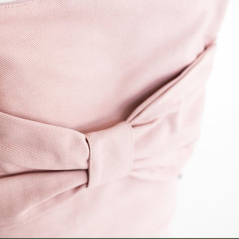 4. Detailed view of bow on Muni kids pink waterproof backpack