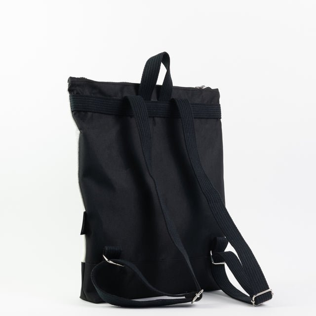 6. Back view of Muni Black Watercolor backpack with adjustable straps