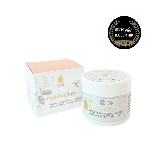 2. Tilk! Probiotic Face Cream with packaging box and award badge, 50ml, studio shot