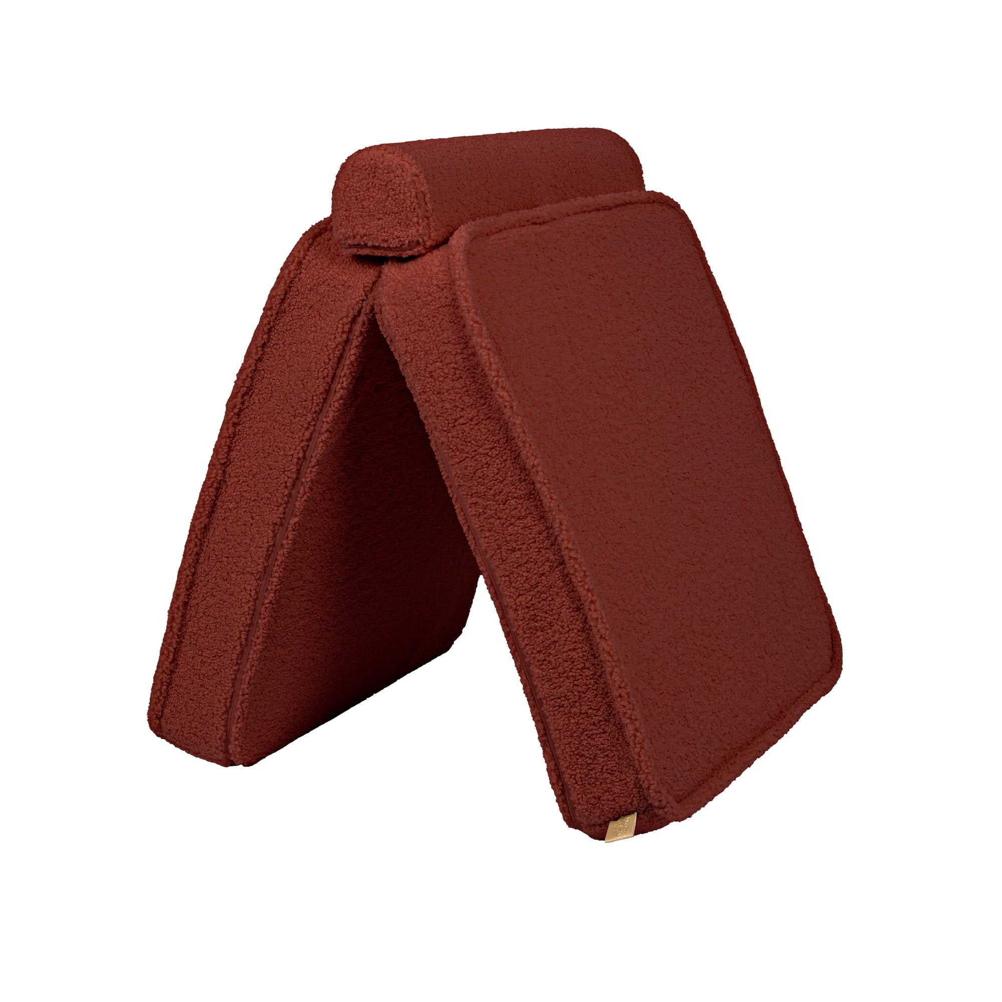 7. Brown modular sofa pieces stacked in a triangular shape, illustrating creative play options