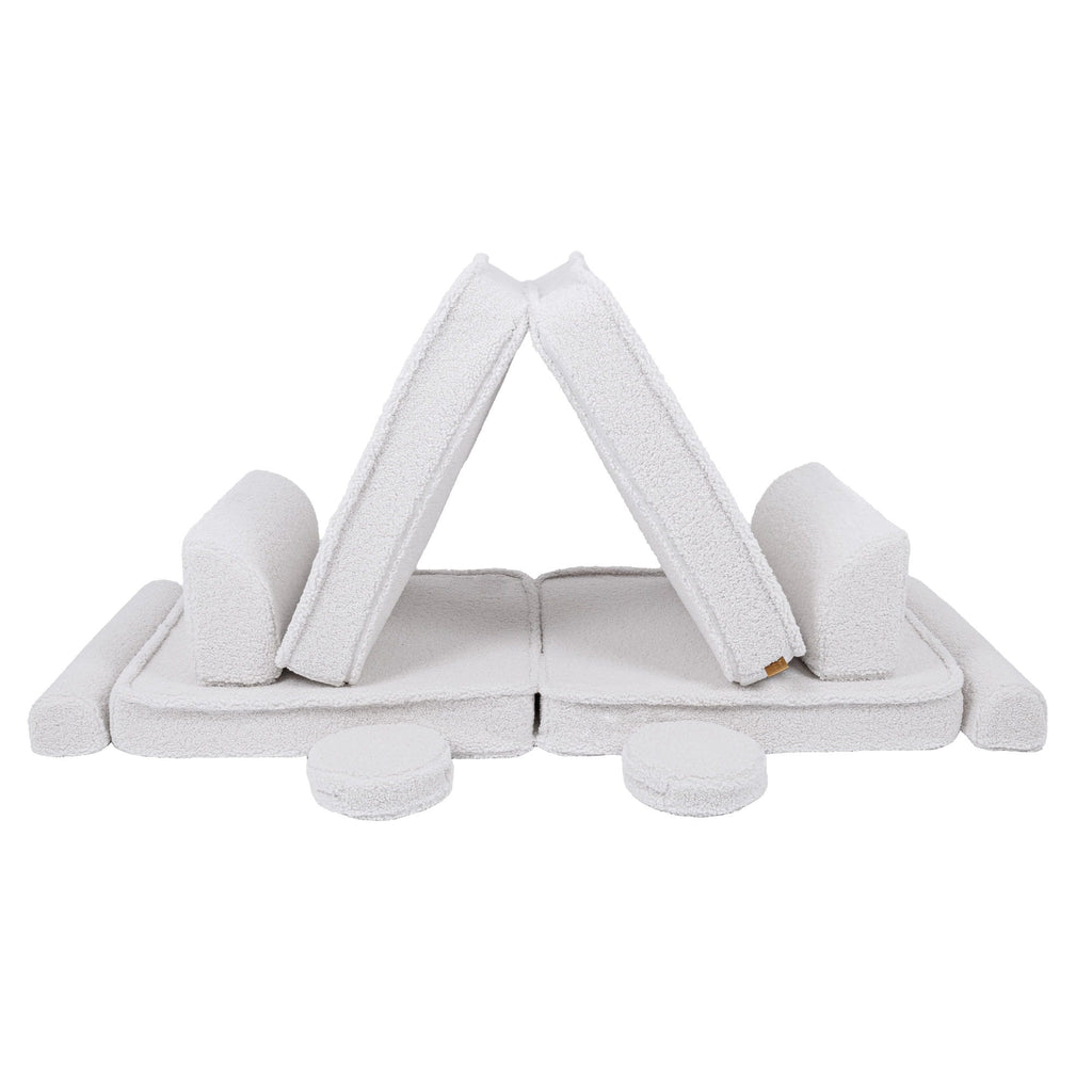 2. Large modular children's sofa in bearly white with cushions forming a tent-like structure
