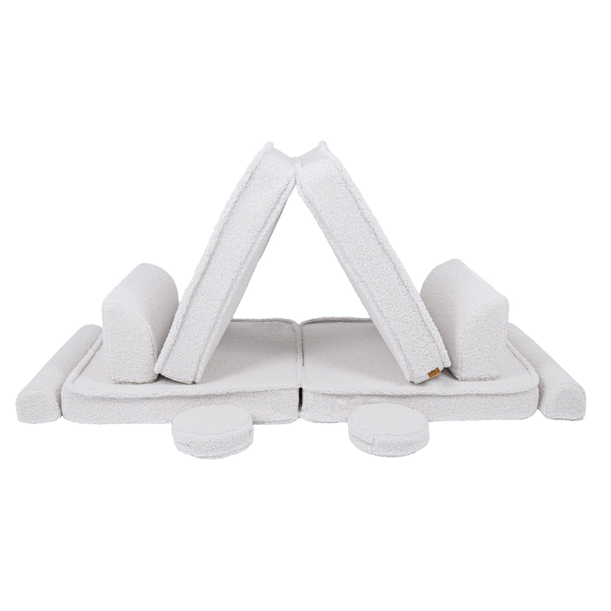 2. Large modular children's sofa in bearly white with cushions forming a tent-like structure