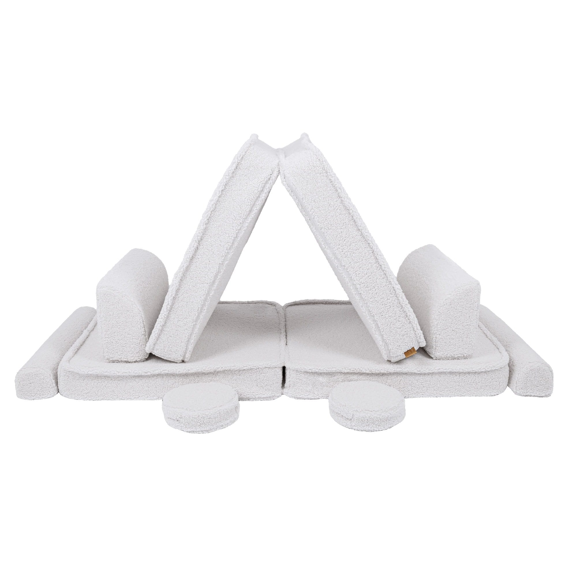 2. Large modular children's sofa in bearly white with cushions forming a tent-like structure