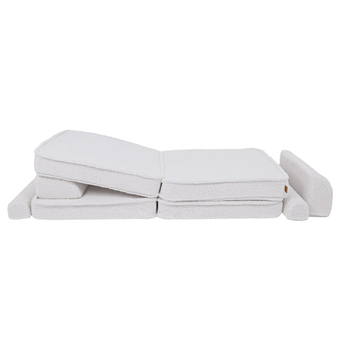 2. Large modular children's sofa in bearly white with cushions arranged in a flat position