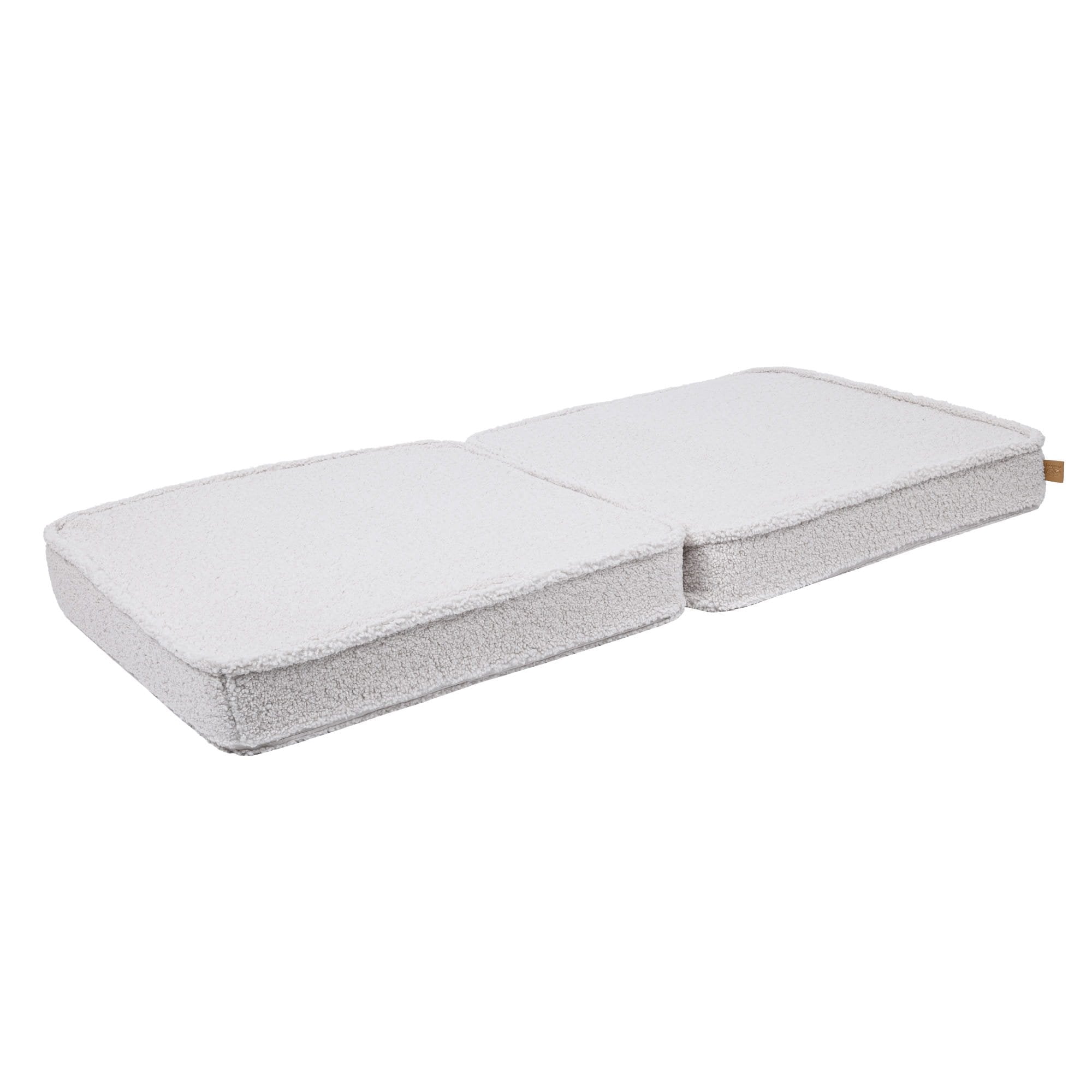 3. Close-up of two flat sofa cushions in bearly white on a white background