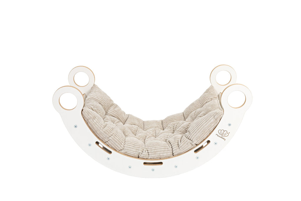 2. White wooden dream rocker with beige cushion, showcasing elegant and comfortable design