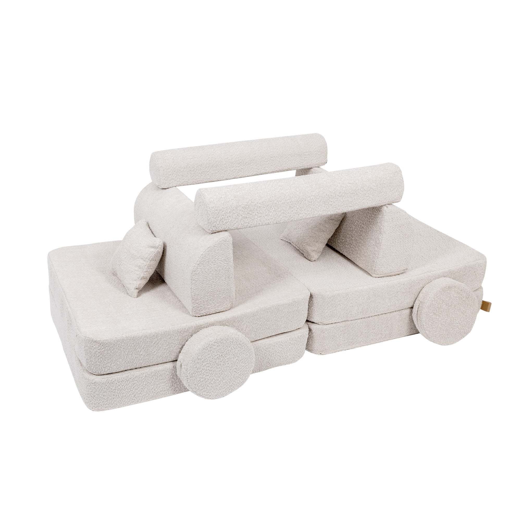 3. Modular children's sofa in champagne ecru boucle fabric, creatively arranged into a play structure with multiple cushions