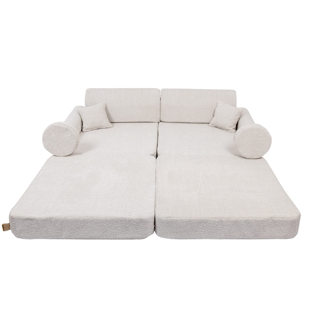 1. Large modular children's sofa in champagne ecru boucle fabric, shown in a flat configuration with two backrests and four cushions