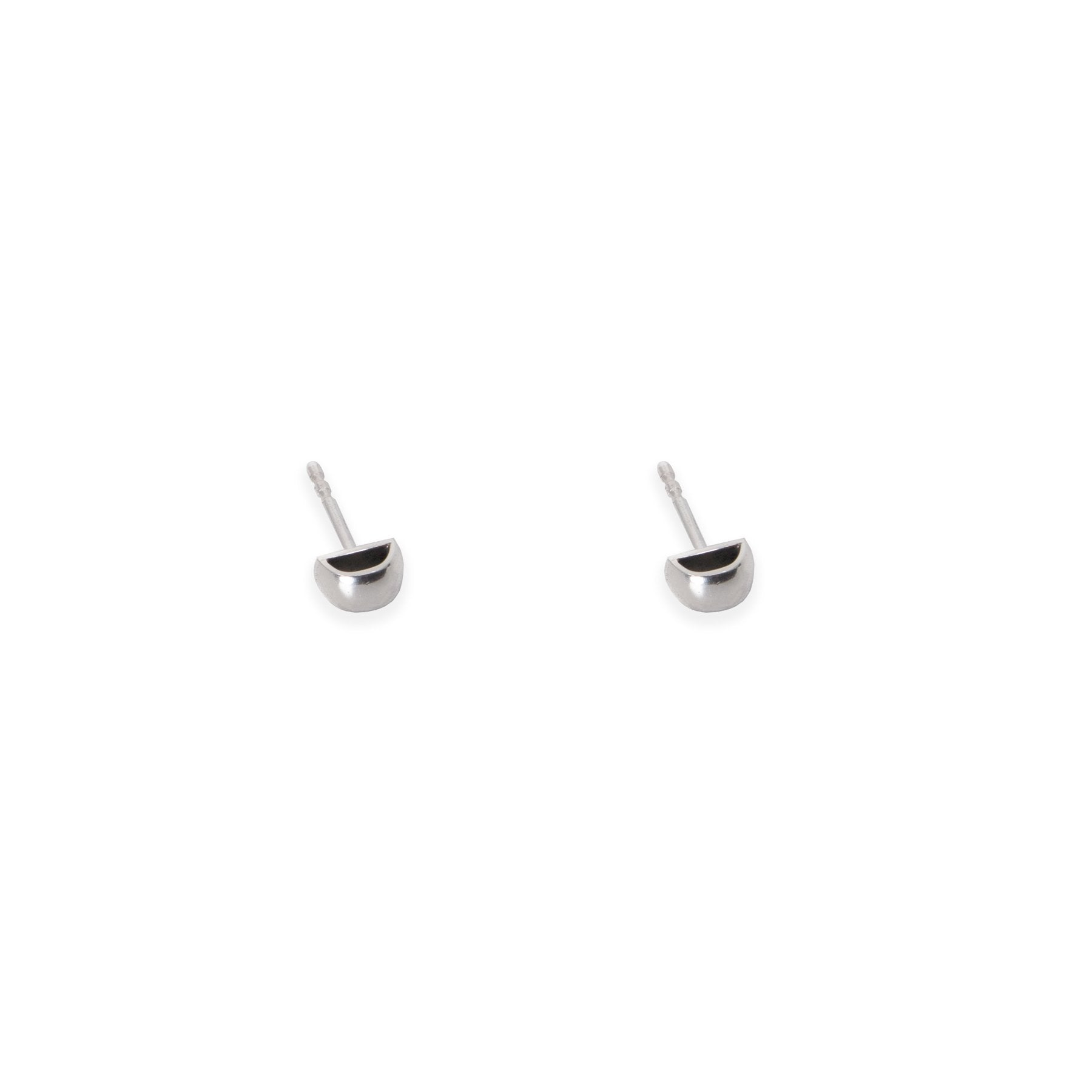 2. Studio image of Maarja Palu HOLLOW small stud earrings in polished silver with minimalist half-circle design