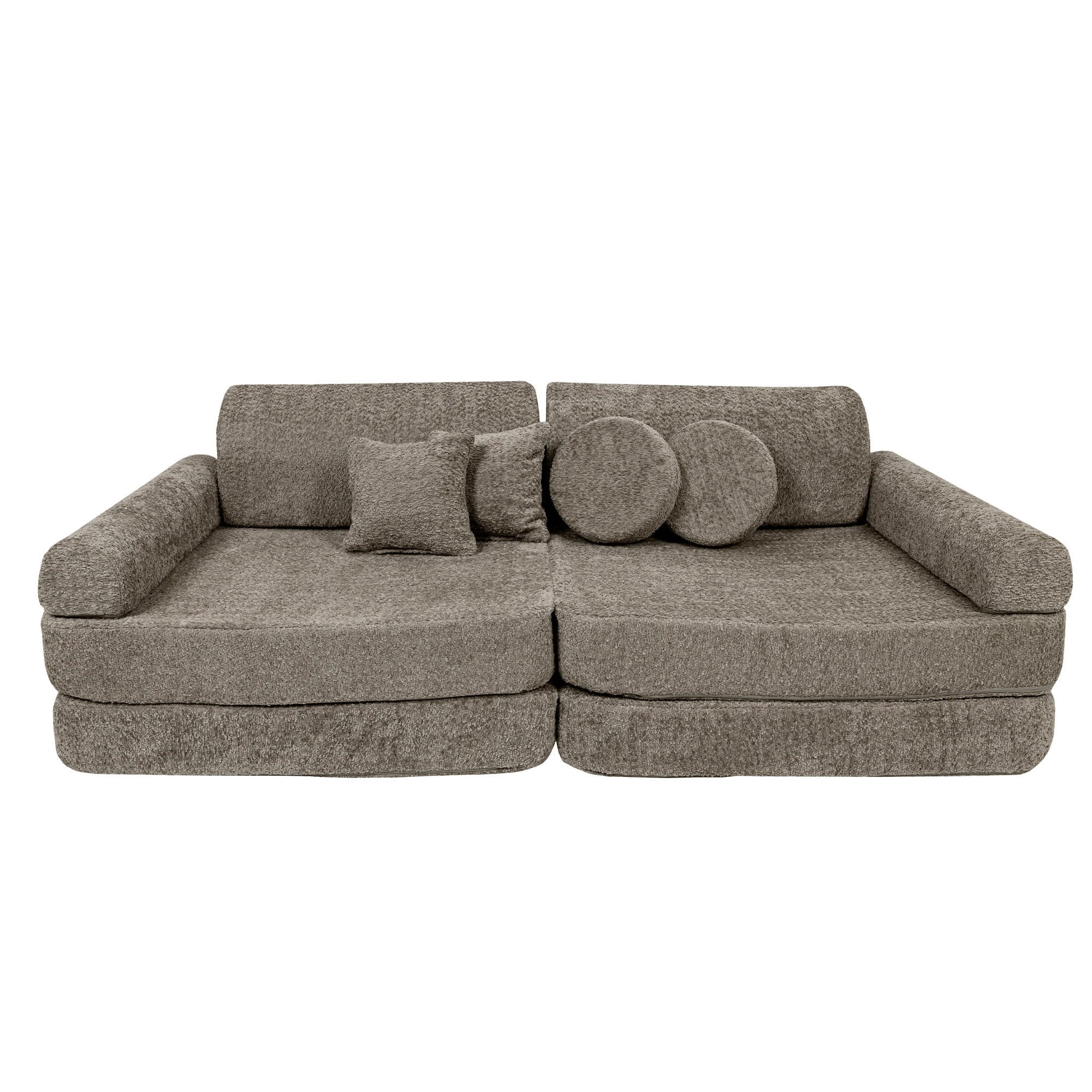 2. Children's modular sofa with multiple cushions in tan beige boucle fabric, studio setting