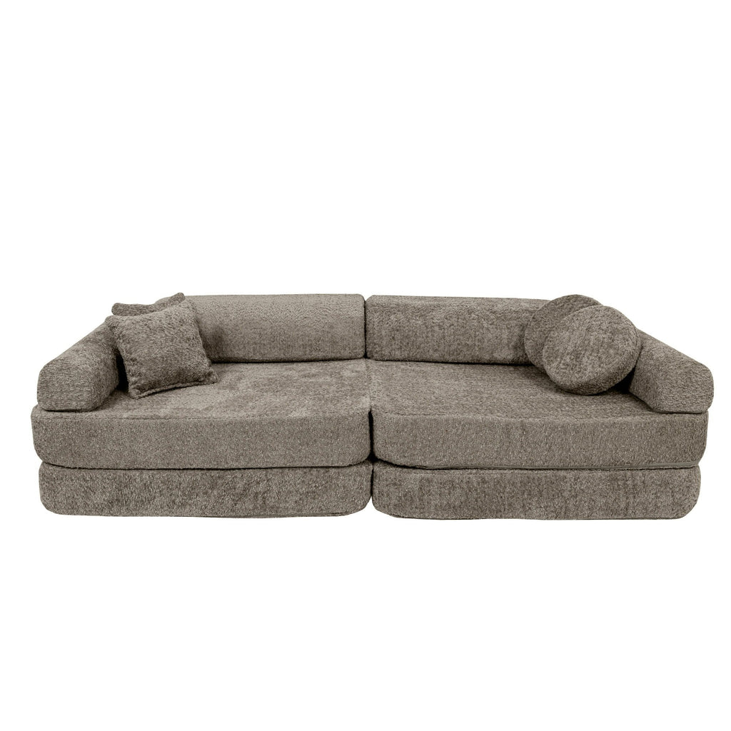 2. Large modular sofa for kids in tan beige boucle fabric with cushions, studio view