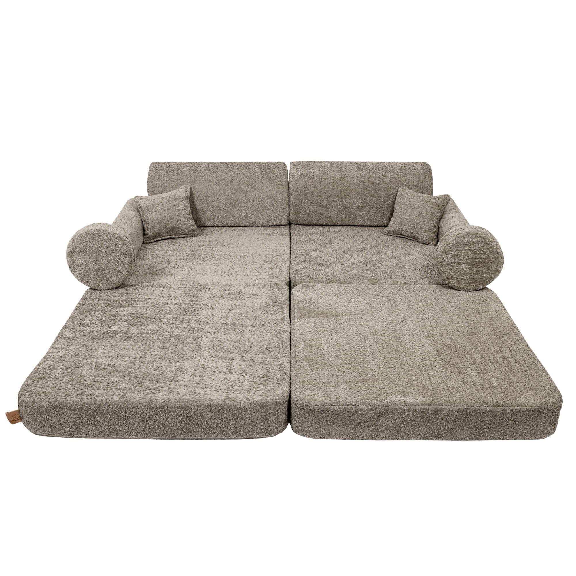 2. Children's modular sofa laid flat, tan beige boucle fabric, studio setting