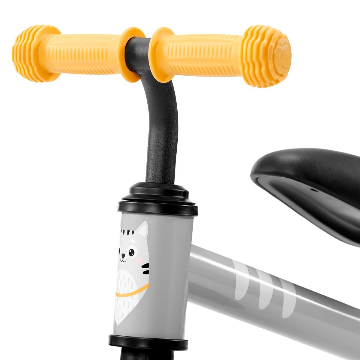 11. Close-up of yellow non-slip handles on Kinderkraft CUTIE balance bike