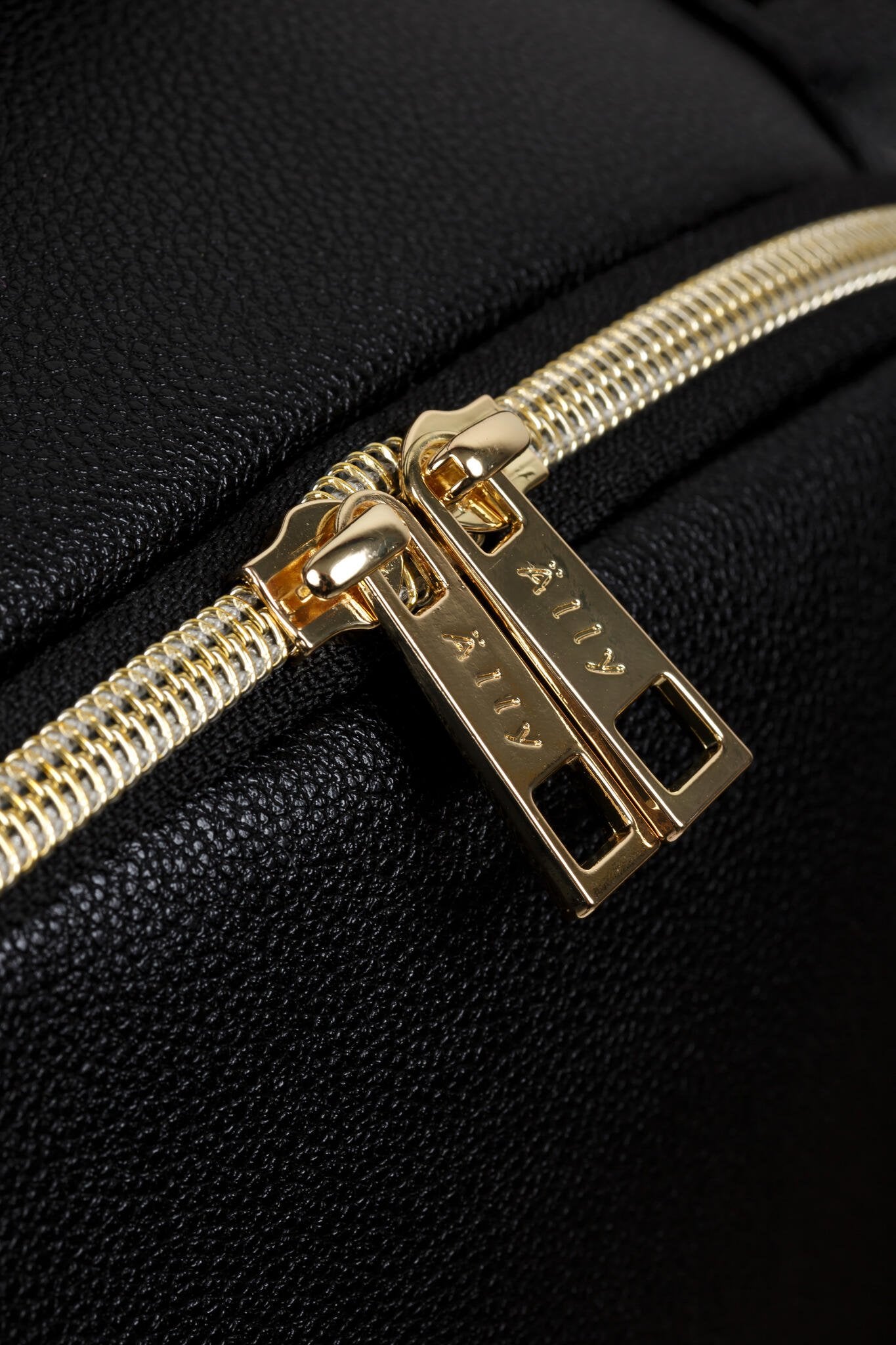 12. Close-up of YKK zippers on Ally Scandic Espresso Diaper Backpack, showcasing quality hardware