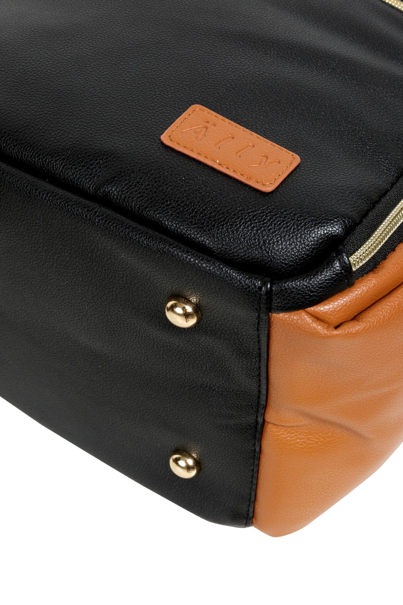 13. Close-up of metal bottom studs on Ally Scandic Small Diaper Backpack in Black Coffee