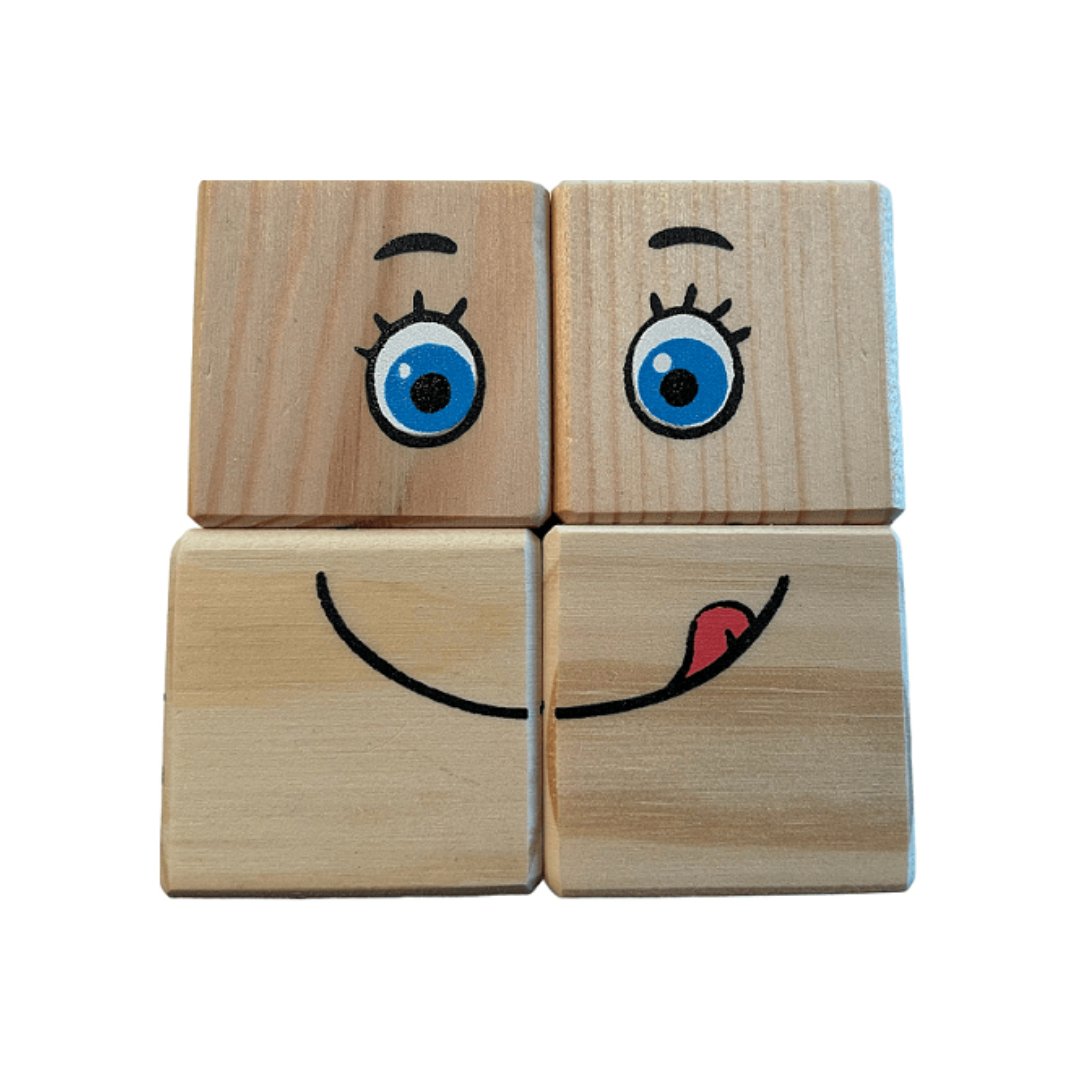 1. Four pinewood blocks forming a happy face with blue eyes and a tongue sticking out, part of ROOSI Traditional Toys' Special Expressions Blocks for Kids