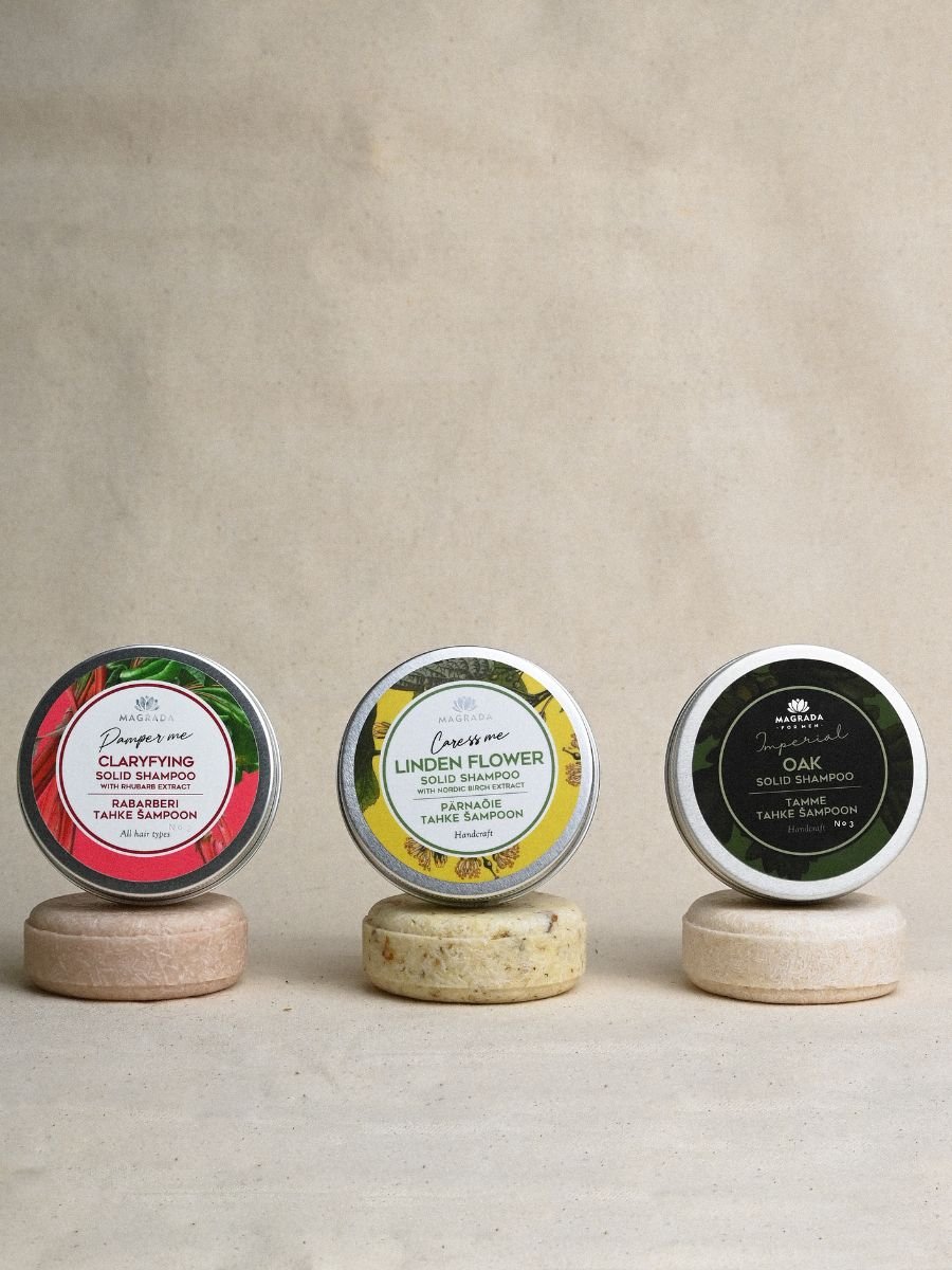 2. Trio of Magrada Organic Cosmetics solid shampoos, including Clarifying with rhubarb, Linden Flower, and Oak, displayed on stands