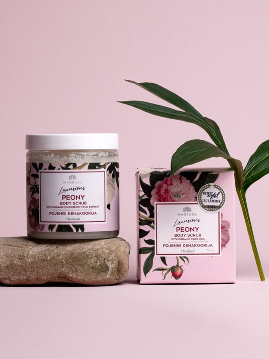 1. Magrada Organic Cosmetics Peony Body Scrub jar and box with floral design on pink background