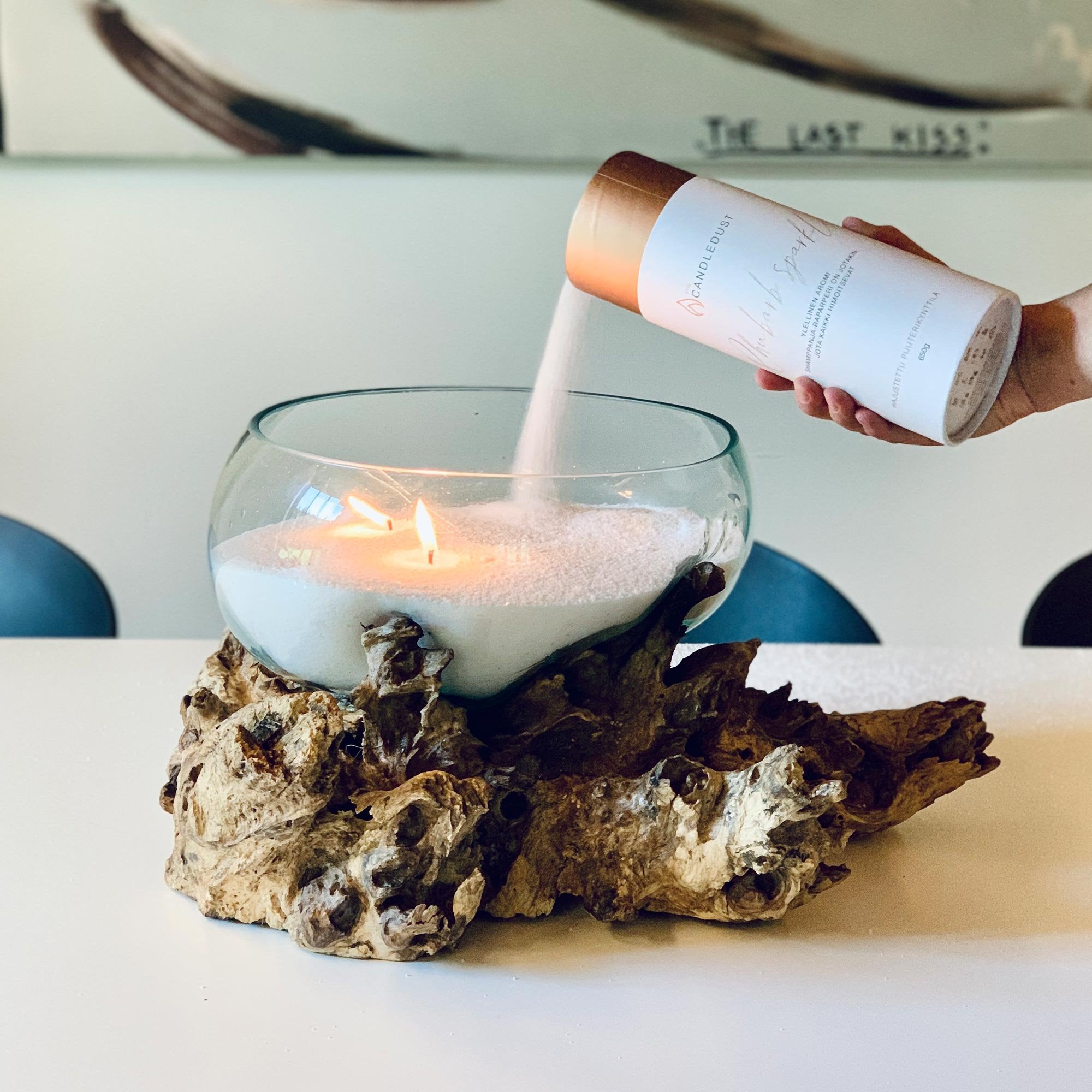 6. Candledust Powder Candle - Breeze being poured into a large decorative bowl with lit candle