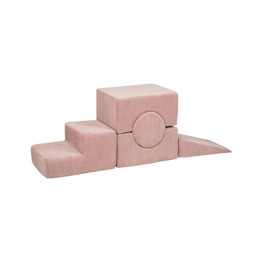 4. Flat lay of powder pink velvet corduroy children's shape set with geometric blocks, highlighting texture and design