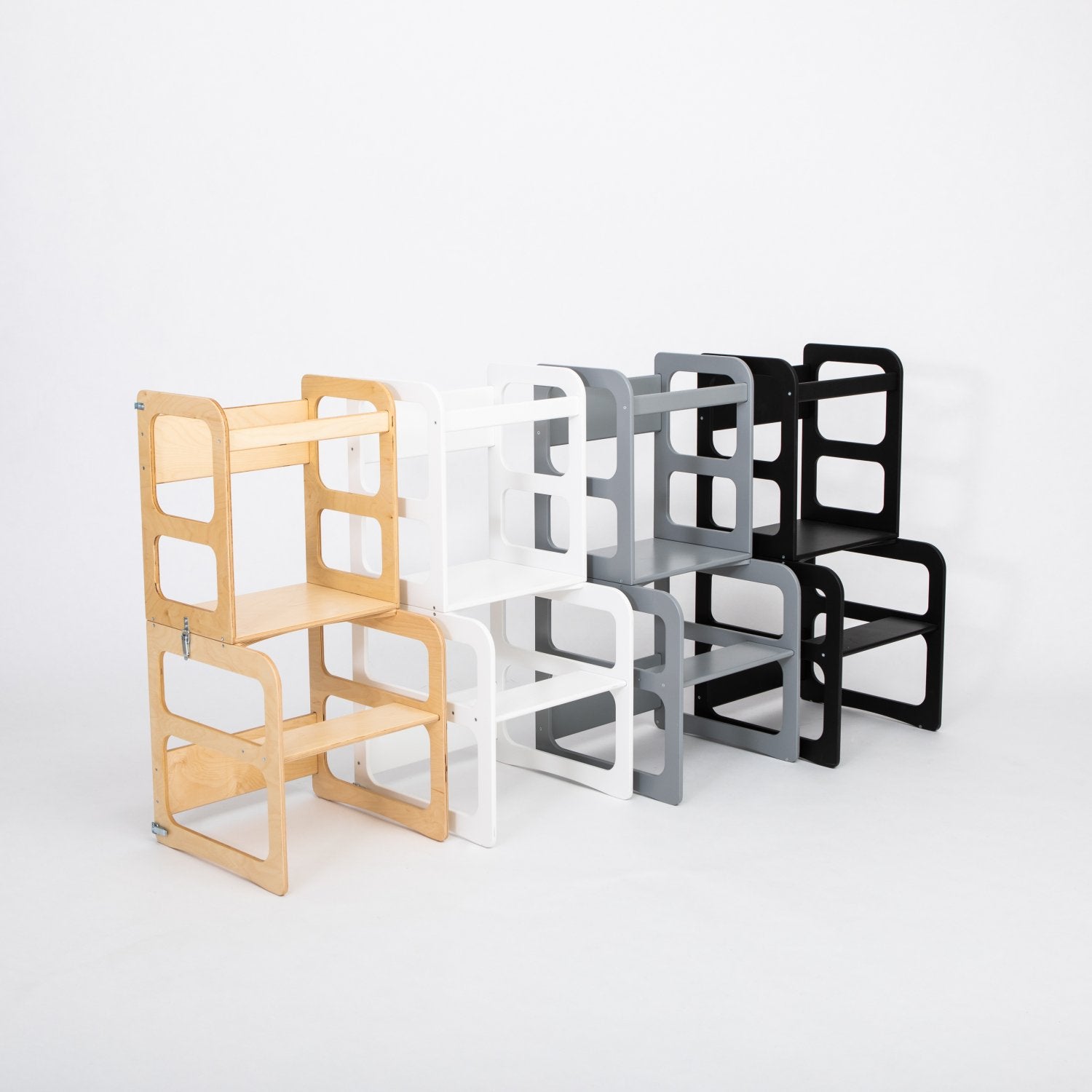 5. Lineup of kitchen towers in natural, white, grey, and black finishes on white background