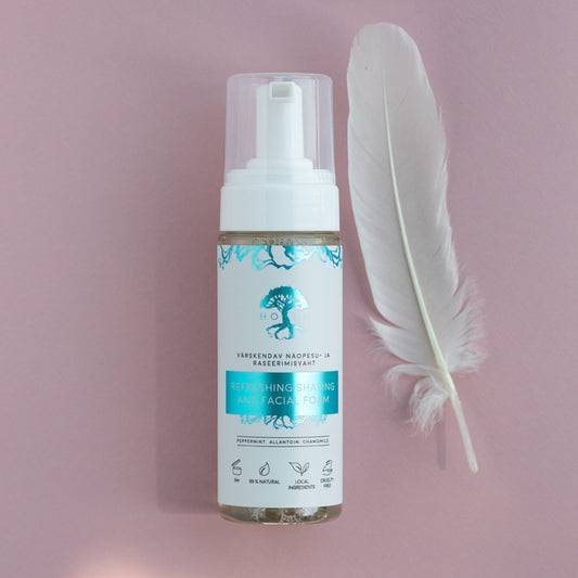 1. HOIA homespa refreshing shaving and facial foam with peppermint, shown with feather on pink background