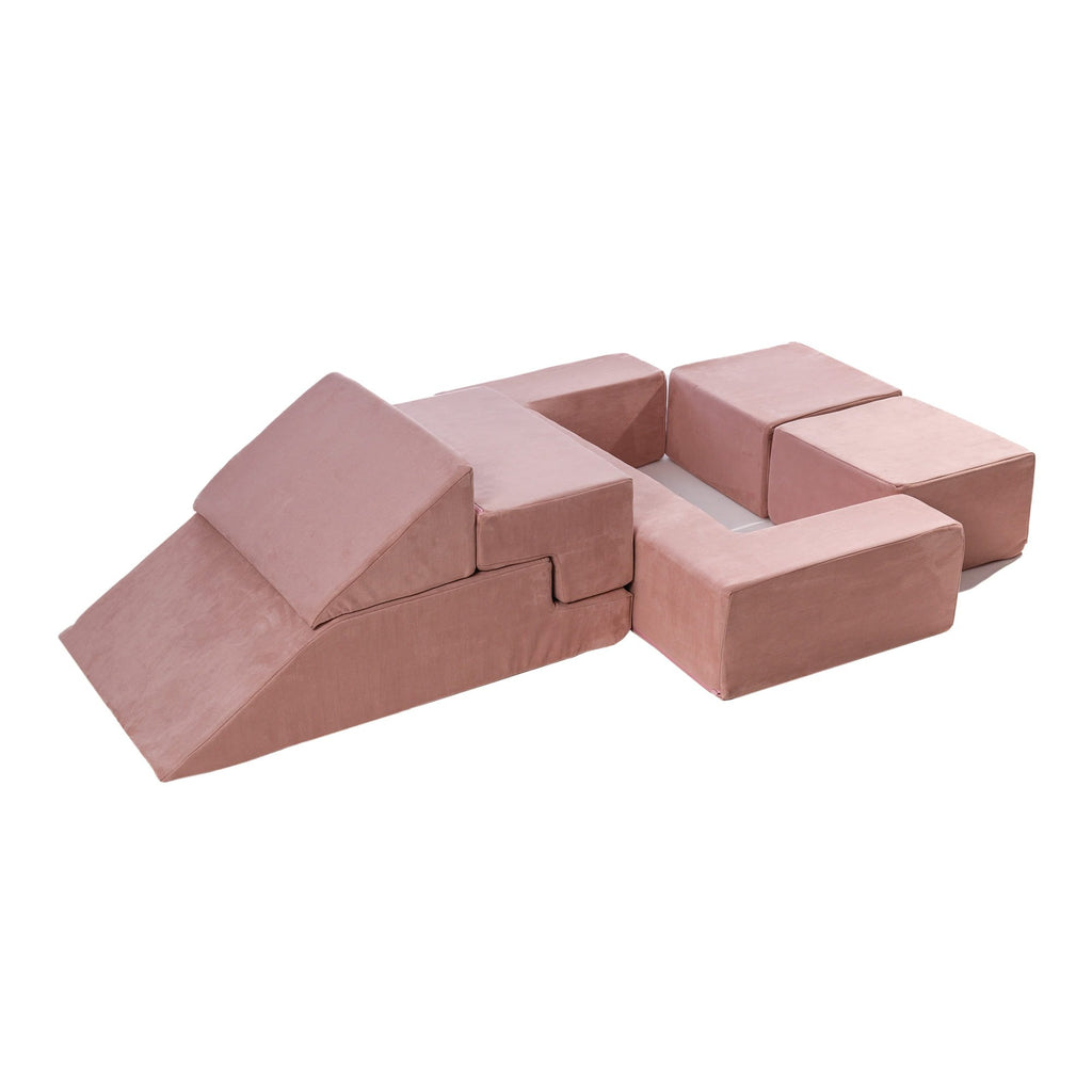 4. Pink velvet children's playground set arranged with a slide and seating area