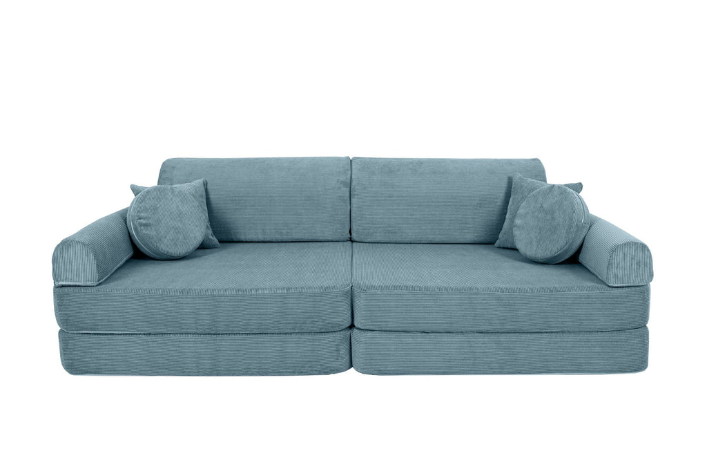 3. Turquoise corduroy children's sofa with cylindrical and square cushions, arranged as a traditional sofa on a black background