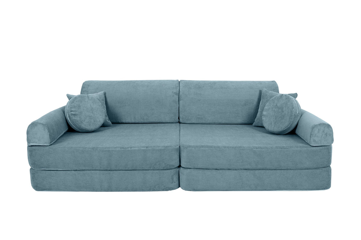 3. Turquoise corduroy children's sofa with cylindrical and square cushions, arranged as a traditional sofa on a black background