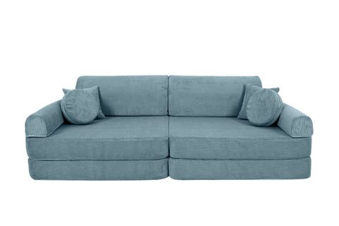 3. Turquoise corduroy children's sofa with cylindrical and square cushions, arranged as a traditional sofa on a black background