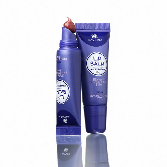 2. Magrada Organic Cosmetics Blueberry Tinted Lip Balm in purple tube, showing product texture and vegan label