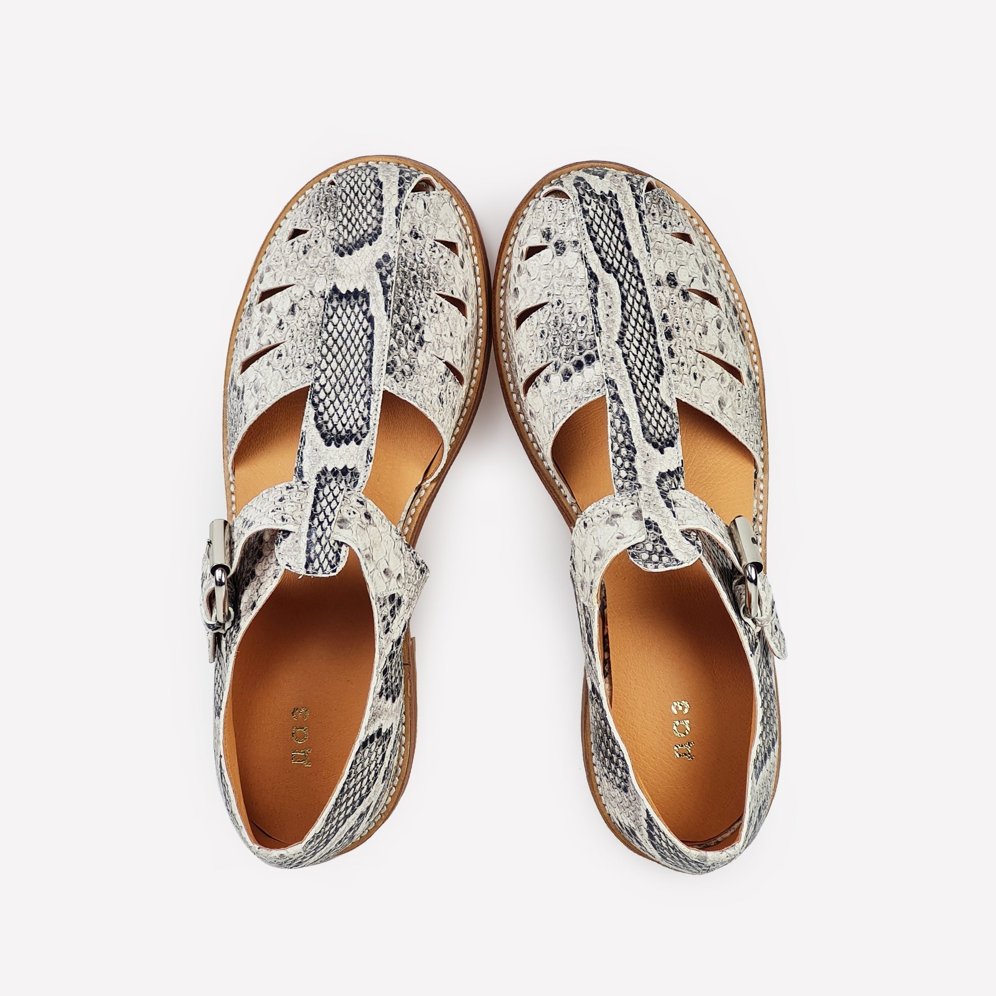 4. Top view of Daz Studio handmade snake print sandals with leather insole and silver-tone buckle